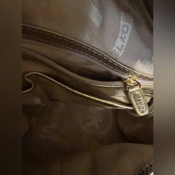 Michael Kors Metallic Gold Leather Drawstring Shoulder Bag. - Picture 15 of 16